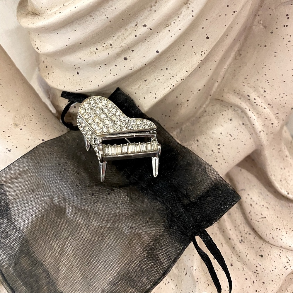 Crystal piano brooch
